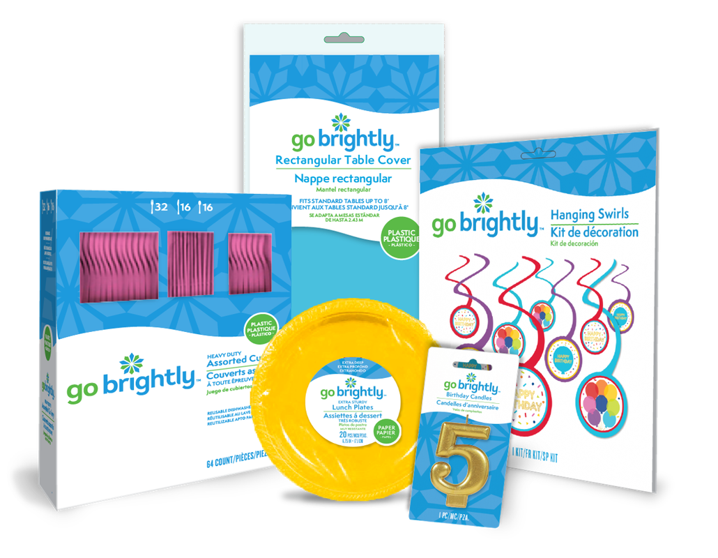 Product grouping of table cover, pink cutlery, yellow plates, #5 molded candle & rainbow celebration hanging swirl decorations.  All in go brightly packaging.
